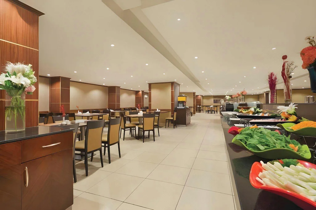 Dining room at Grand Al Massa Hotel