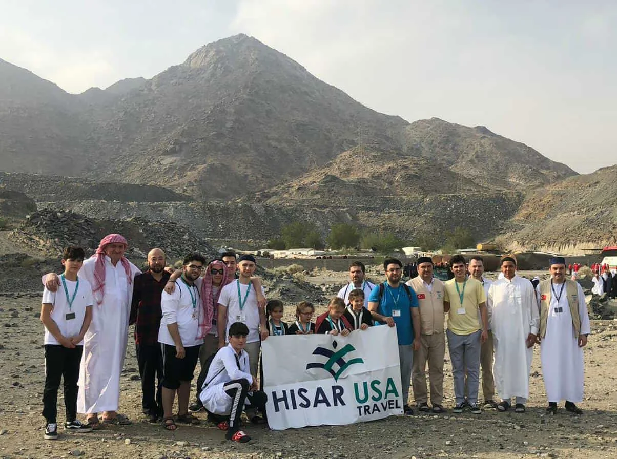 A Hisar Tour group of pilgrims and families during ziyarah in the hills outside Makkah, February 2020
