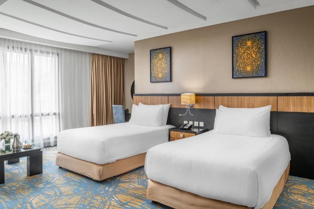 Representative twin guest room at Dar Al Ghufran