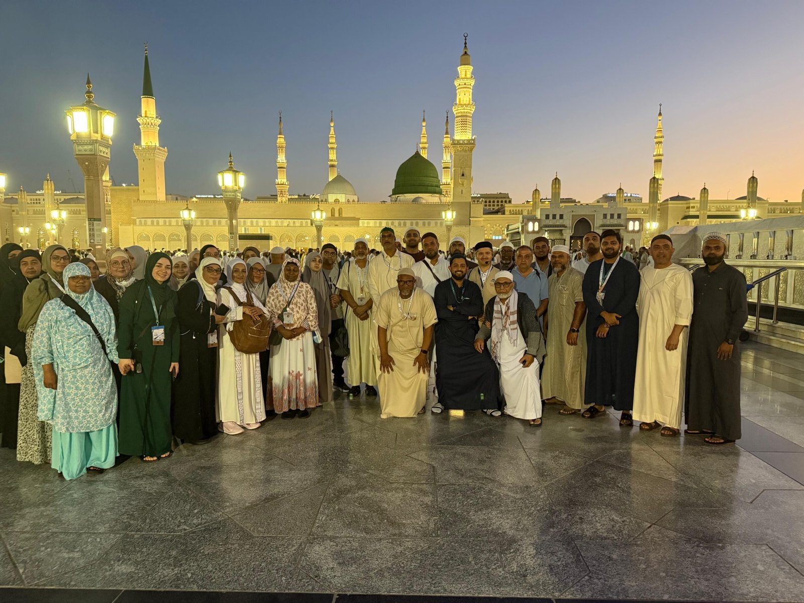 A previous Hisar Tour group in the courtyard of Al-Masjid an-Nabawi in Madinah at dusk